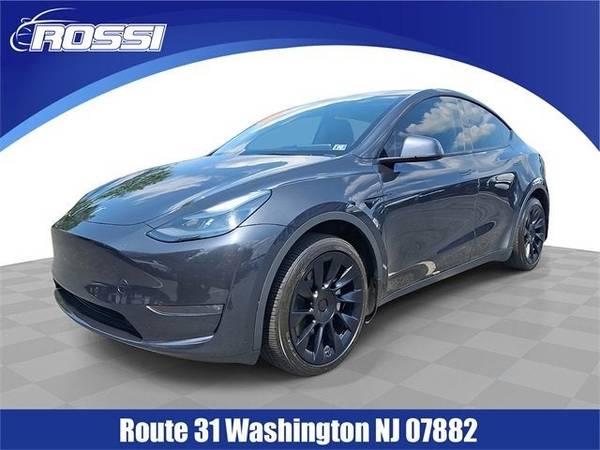 Tesla Model Y with VIN: 7SAYGDEE0RF987579