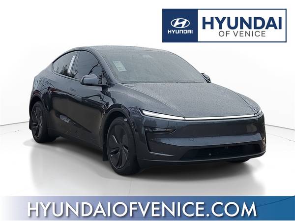 Tesla Model Y with VIN: 7SAYGDEE3TA388633
