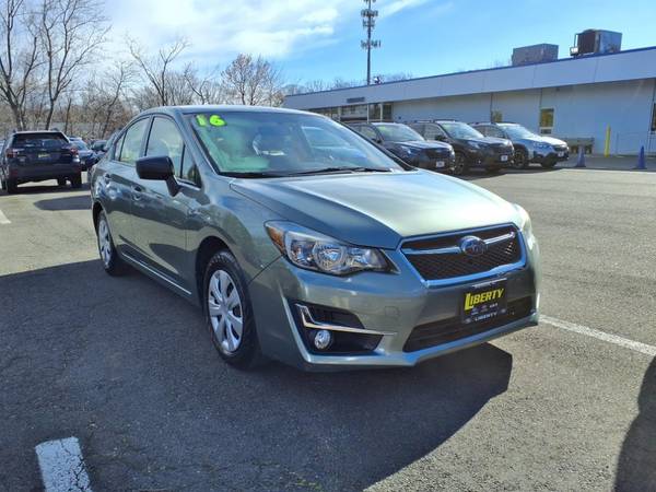 Subaru Impreza with VIN: JF1GJAA6XGG003595