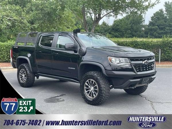 Chevrolet Colorado with VIN: 1GCGTEEN4J1303978