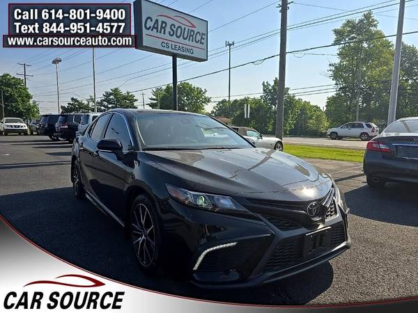 Toyota Camry with VIN: 4T1G11AKXNU710827