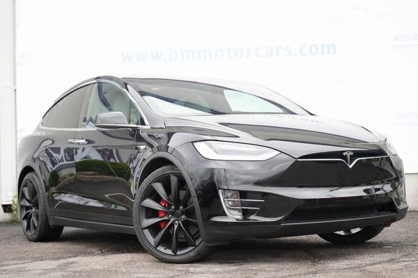 Tesla Model X with VIN: 5YJXCDE49LF262520