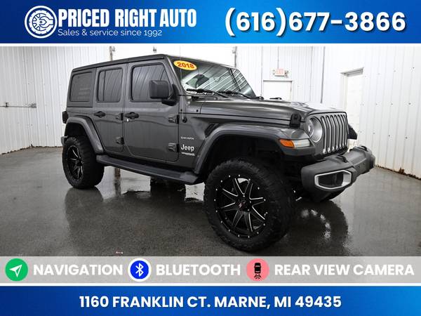 Jeep Wrangler with VIN: 1C4HJXEG6JW169212