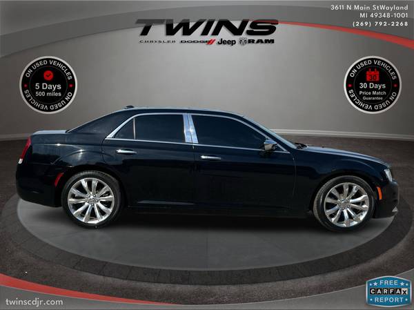 Chrysler 300 with VIN: 2C3CCAEG6FH921583