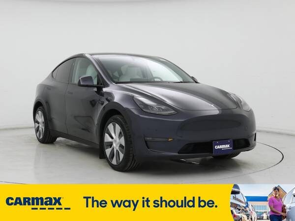 Tesla Model Y with VIN: 7SAYGDEE6RA244650