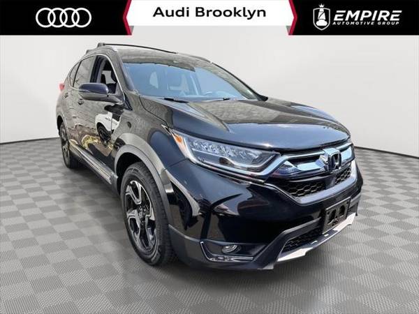 Honda CR-V with VIN: JHLRW2H97KX005794