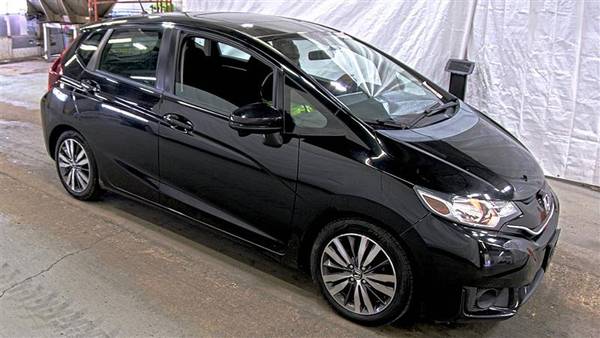 Honda Fit with VIN: 3HGGK5H84FM700997