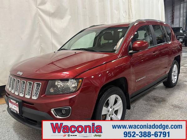 Jeep Compass with VIN: 1C4NJDEB0FD216324