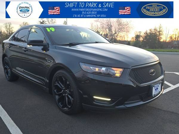 Ford Taurus with VIN: 1FAHP2KT4KG100099