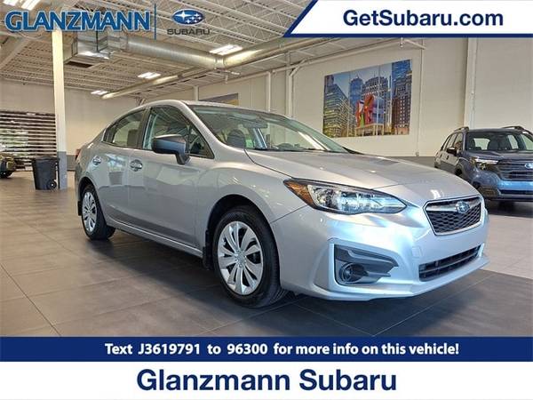 Subaru Impreza with VIN: 4S3GKAA63J3619791