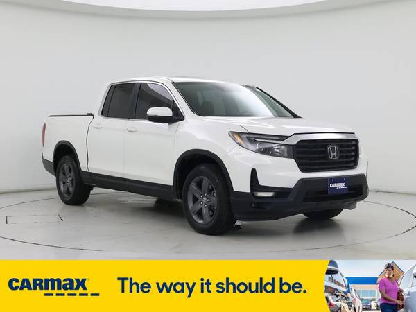 Honda Ridgeline with VIN: 5FPYK3F57PB066565