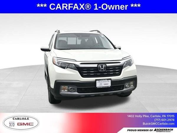Honda Ridgeline with VIN: 5FPYK3F70KB013877
