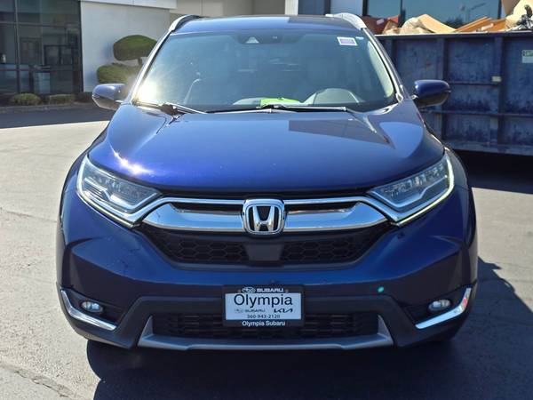 Honda CR-V with VIN: 7FARW2H9XKE046710