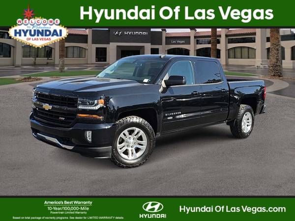 Chevrolet Silverado 1500 with VIN: 3GCUKREC0JG321147
