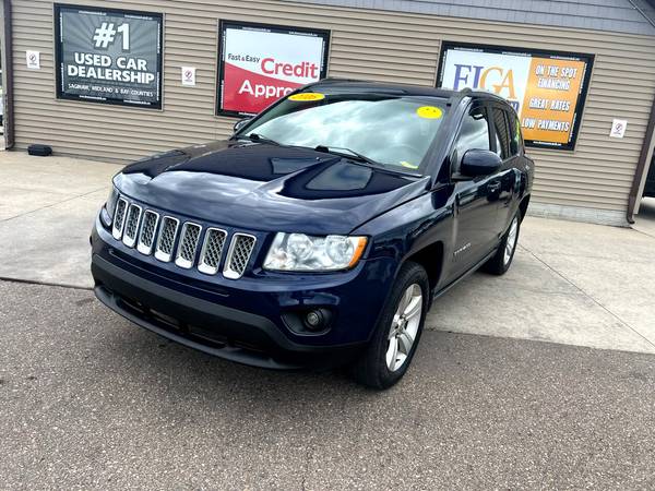Jeep Compass with VIN: 1C4NJDEB1GD758033