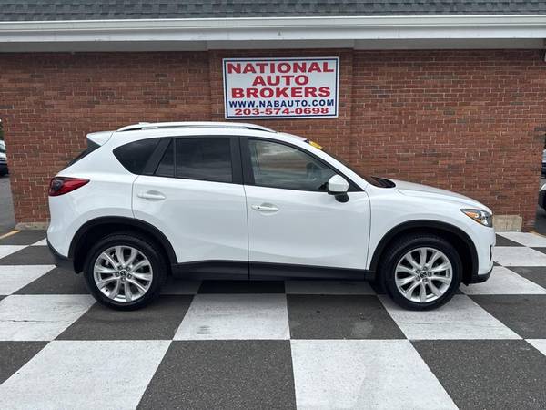 Mazda CX-5 with VIN: JM3KE4DY6E0321167