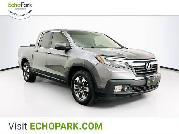 Honda Ridgeline with VIN: 5FPYK3F57JB003134