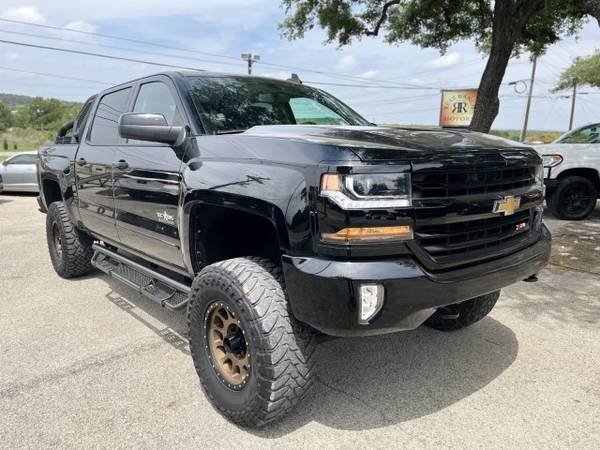 Chevrolet Silverado 1500 with VIN: 3GCUKREC4JG515406