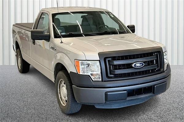 Ford F-150 with VIN: 1FTMF1CMXEKF17824