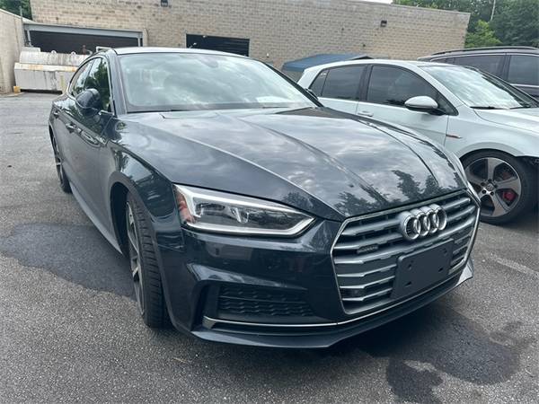 Audi A5 with VIN: WAUENCF59JA015102