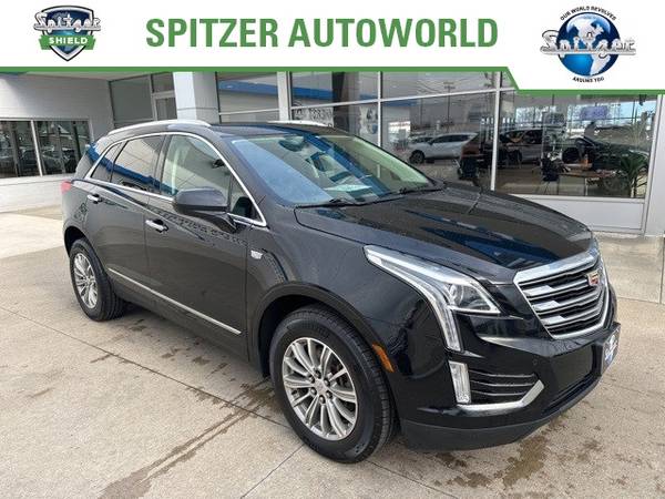Cadillac XT5 with VIN: 1GYKNCRS8JZ100001