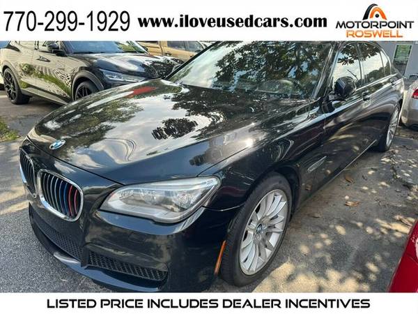 BMW 7 Series with VIN: WBAYF4C50FGS99194