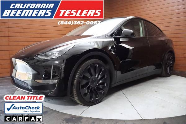 Tesla Model Y with VIN: 7SAYGDEF0PF765565