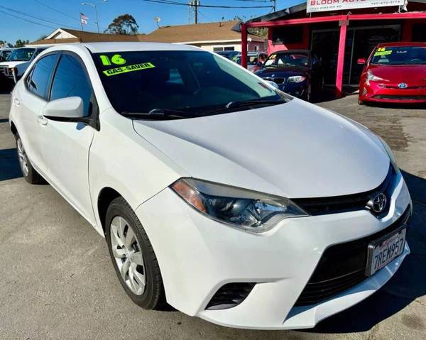 Toyota Corolla with VIN: 2T1BURHE3GC587277