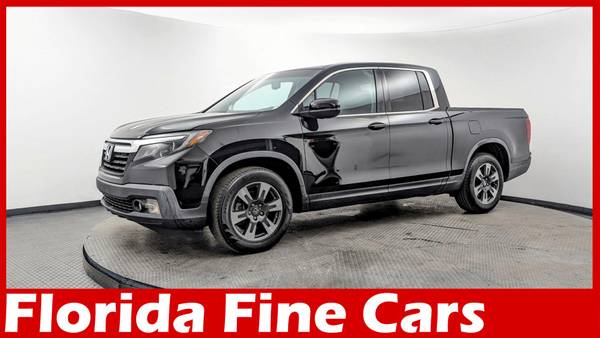 Honda Ridgeline with VIN: 5FPYK2F60JB002300