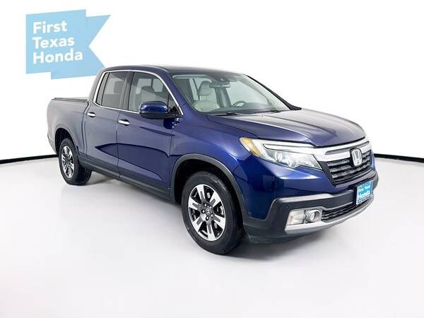 Honda Ridgeline with VIN: 5FPYK3F7XHB001728