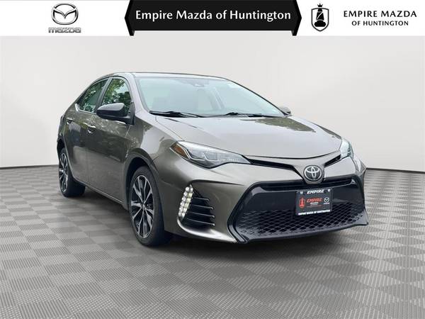 Toyota Corolla with VIN: 2T1BURHEXJC013752