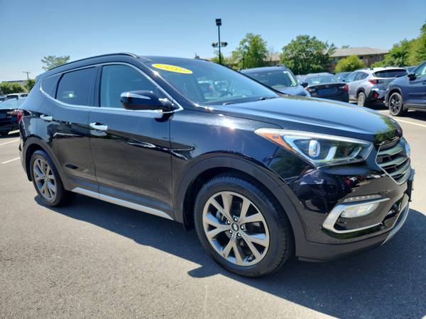 Hyundai Santa Fe Sport with VIN: 5XYZWDLA9JG504138