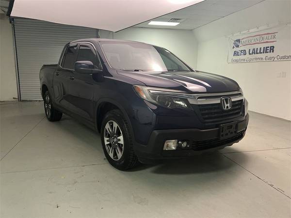Honda Ridgeline with VIN: 5FPYK3F51KB011487