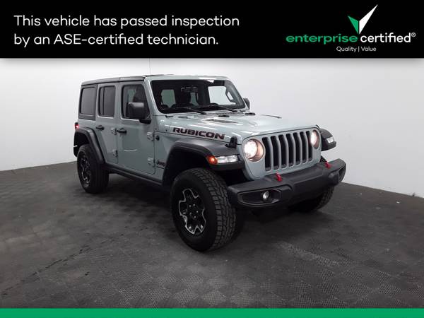 Jeep Wrangler with VIN: 1C4HJXFN4PW702244