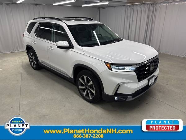 Honda Pilot with VIN: 5FNYG1H86PB057717