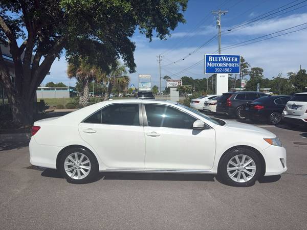 Toyota Camry with VIN: 4T1BF1FK0EU459014