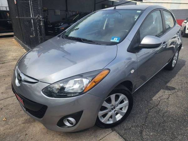 Mazda 2 with VIN: JM1DE1LZXE0174264