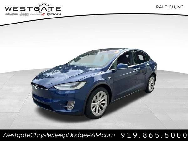 Tesla Model X with VIN: 5YJXCBE44JF122084