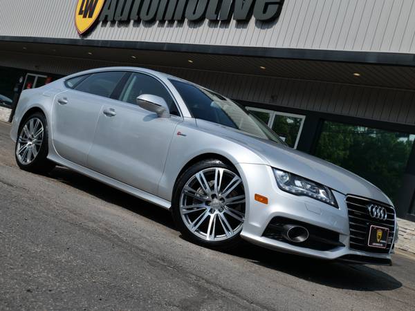 Audi A7 with VIN: WAU2GAFC6EN090418