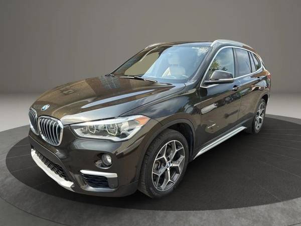 BMW X1 with VIN: WBXHU7C33H5H33993