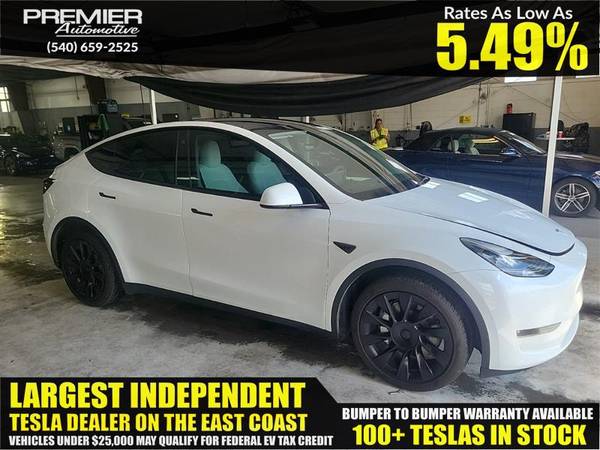 Tesla Model Y with VIN: 7SAYGDEE8PA119808