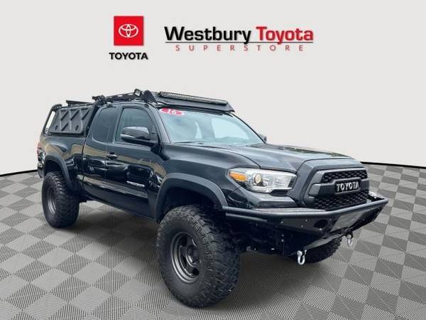 Toyota Tacoma with VIN: 5TFSZ5AN0GX034995