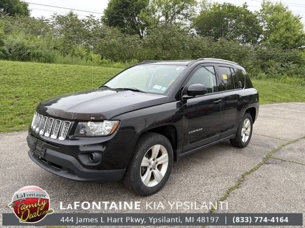Jeep Compass with VIN: 1C4NJDEB8GD776206
