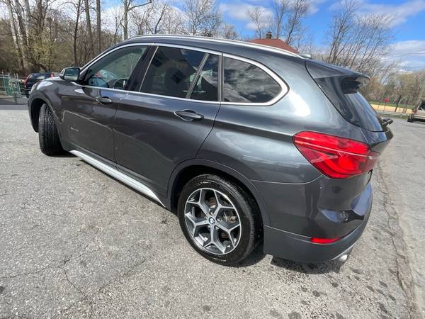 BMW X1 with VIN: WBXHT3C3XH5F72411