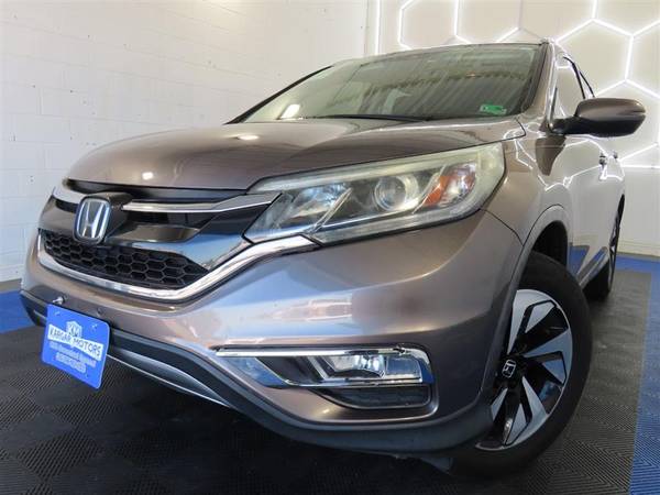 Honda CR-V with VIN: 5J6RM4H97FL128243