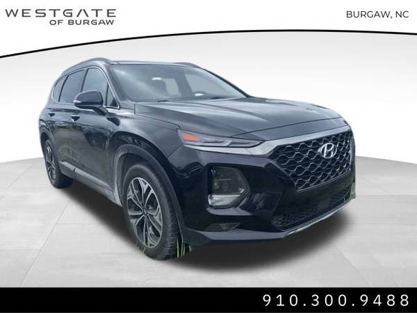 Hyundai Santa Fe with VIN: 5NMS5CAA1KH136661