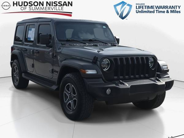 Jeep Wrangler with VIN: 1C4HJXDG0NW265344