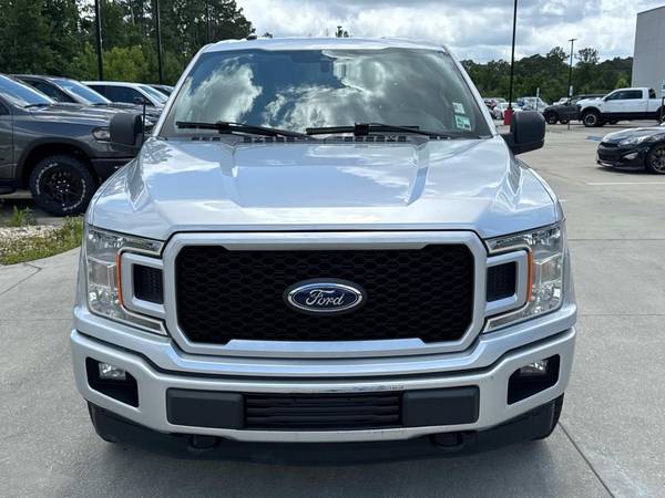 Ford F-150 with VIN: 1FTEW1E56KFC03957