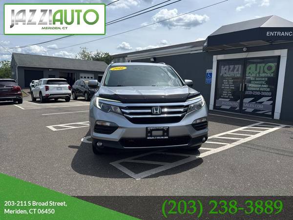 Honda Pilot with VIN: 5FNYF6H05GB091822