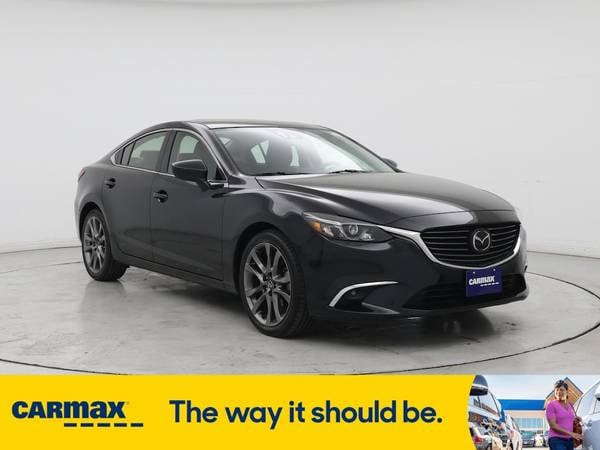 Mazda 6 with VIN: JM1GJ1W59G1430067